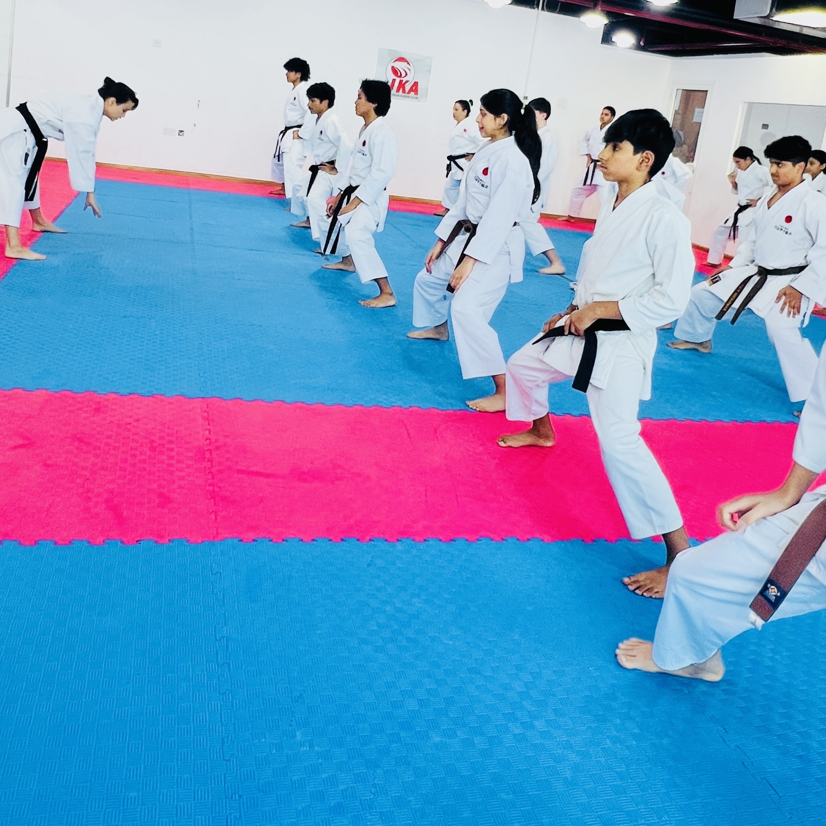 Shotokan karate black belt students in Dubai 2026