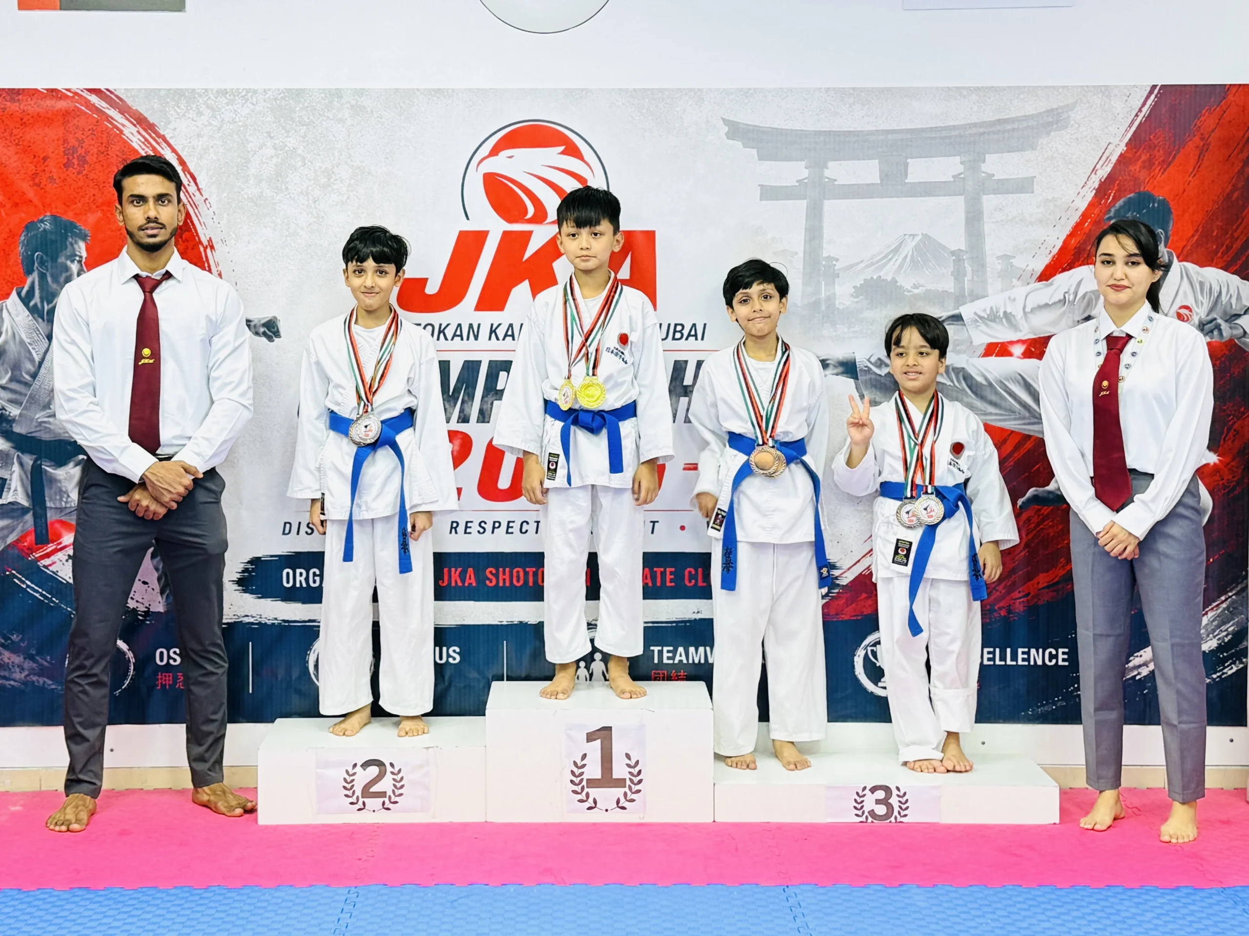 Kids celebrating their victory at the dojo championship at Shotokan Karate Club Dubai